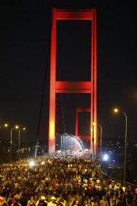 Pro-government demonstrators march over the Bosphorus Bridge, from the Asian to the European side of Istanbul, Turkey, July 21, 2016. REUTERS/Osman Orsal