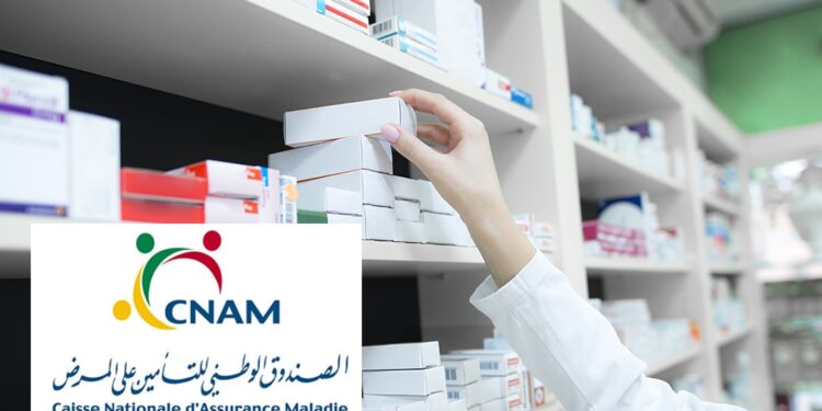 Closeup view of pharmacist hand taking medicine box from the shelf in drug store.