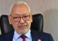 (FILES) In this file photo taken on March 31, 2022 Rached Ghannouchi, head of the Islamist-inspired Ennahdha party, looks on during an interview with AFP at his office in Tunis. A Tunisian court on May 15, 2023 sentenced Rached Ghannouchi, one of the main opponents of Tunisian President Kais Saied, to one year in prison on terrorism-related charges, local media reported. (Photo by FETHI BELAID / AFP)