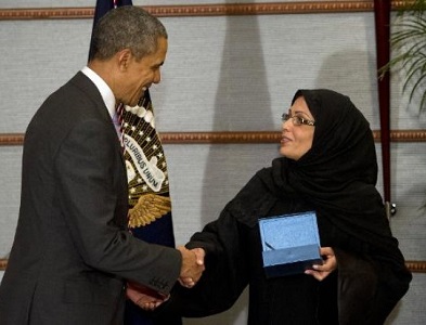 Obama et Mme Muneef (credit photo - AFP) Obama et Mme Muneef (credit photo - AFP)
