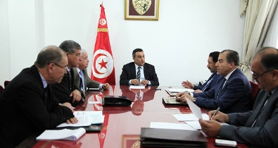 La cellule de crise chargée de la sécurité, en réunion, le 31 juillet 2014, à la Kasbah. (Crédit photo : Présidence du gouvernement)